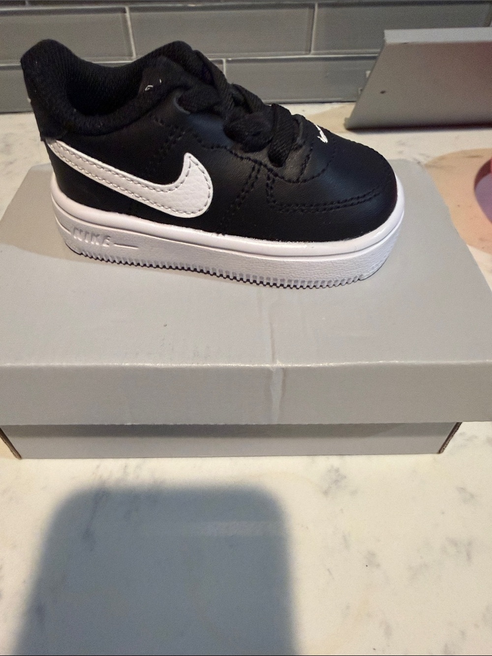 Nike Kids Black and White Low-Top Swoosh Sneaker